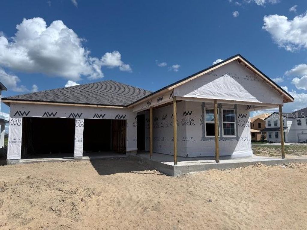 Photo of 30109 Misty Pines Rd, Mount Dora, FL 32757 (MLS # TB8440577)