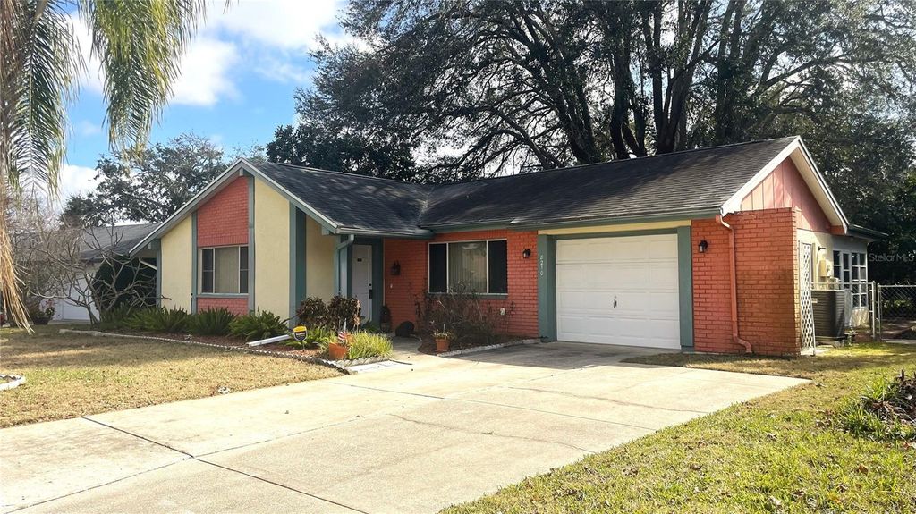 Photo of 8210 Woodsong Row, Hudson, FL 34667 (MLS # TB8472158)