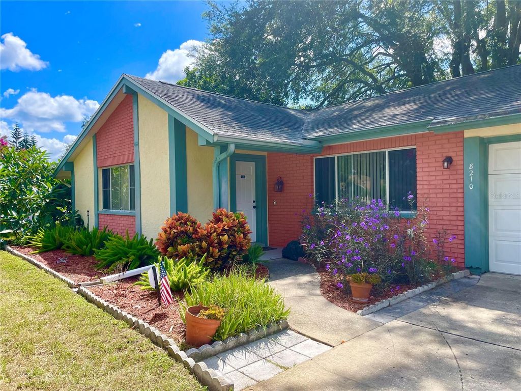 Photo of 8210 Woodsong Row, Hudson, FL 34667 (MLS # TB8472158)