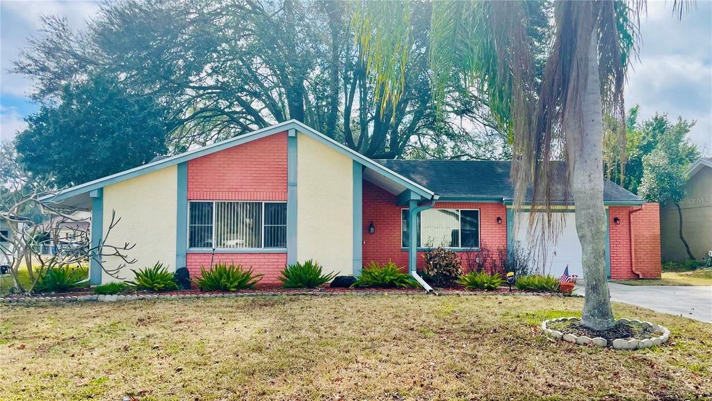 Photo of 8210 Woodsong Row, Hudson, FL 34667 (MLS # TB8472158)