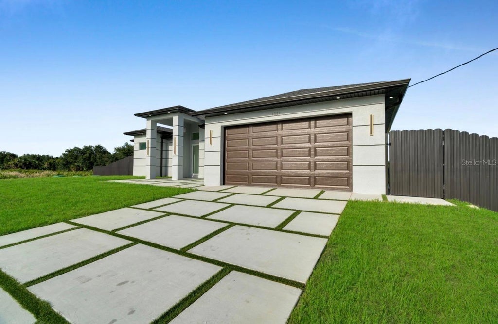 Photo of 1512 Leroy Avenue, Lehigh Acres, FL 33972 (MLS # O6422502)
