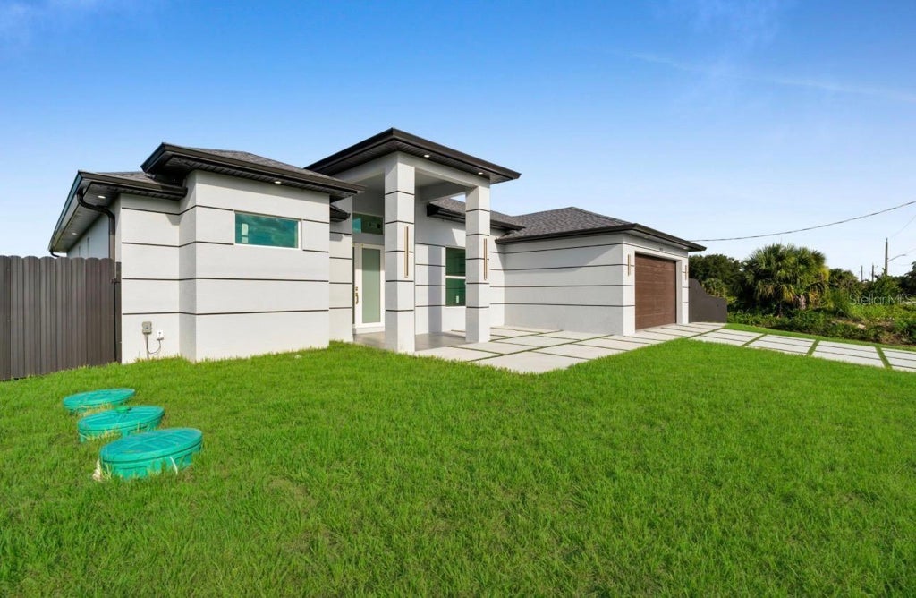 Photo of 1512 Leroy Avenue, Lehigh Acres, FL 33972 (MLS # O6422502)