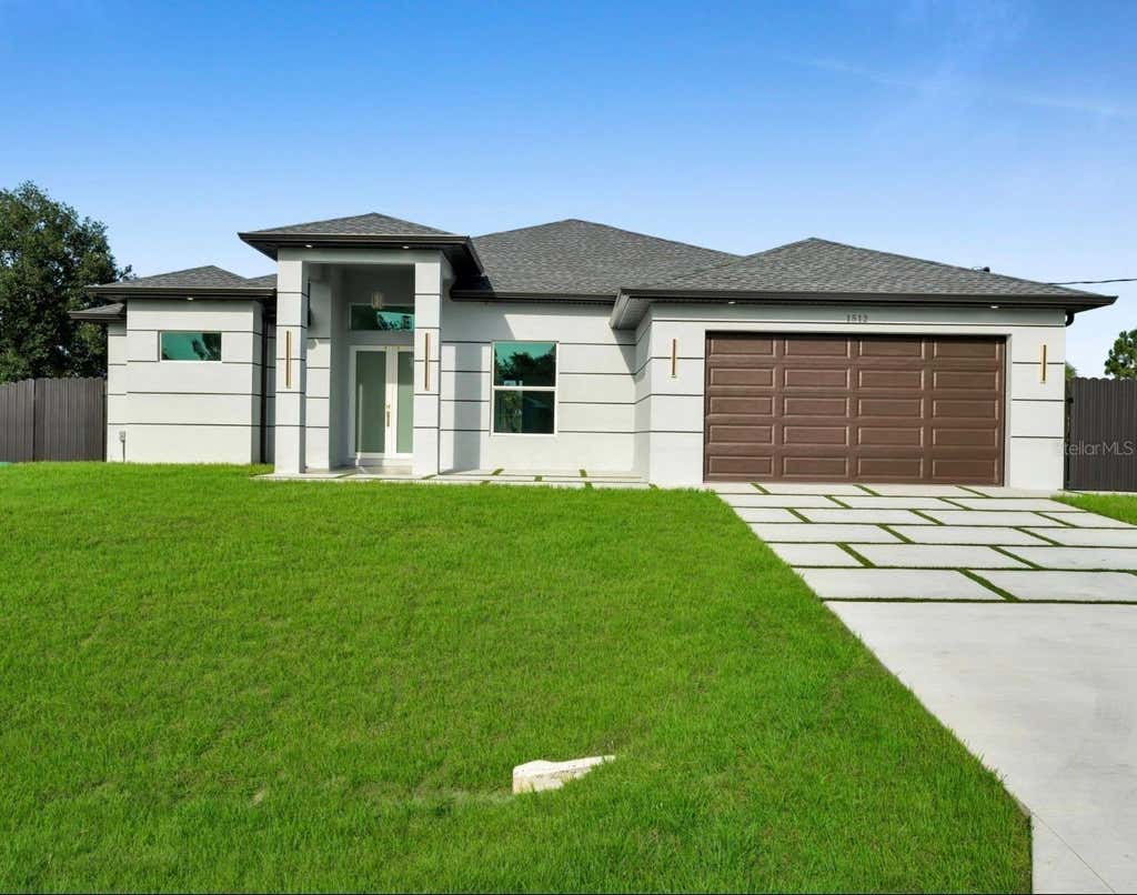 Photo of 1512 Leroy Avenue, Lehigh Acres, FL 33972 (MLS # O6422502)