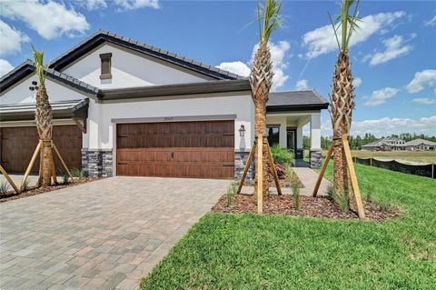 Photo of 35517 Stableton Lane, Zephyrhills, FL 33541 (MLS # TB8470673)