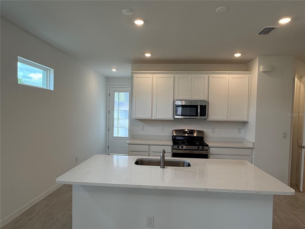 Photo of 3744 Nandina Circle, Sun City Center, FL 33573 (MLS # TB8427095)