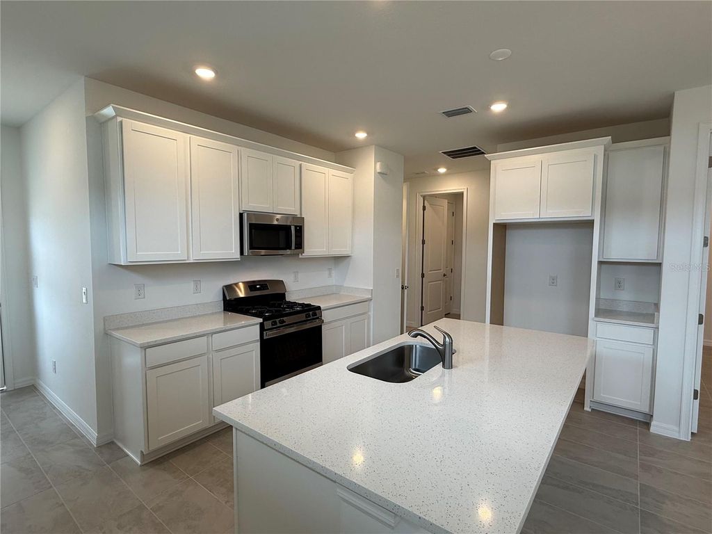 Photo of 3744 Nandina Circle, Sun City Center, FL 33573 (MLS # TB8427095)