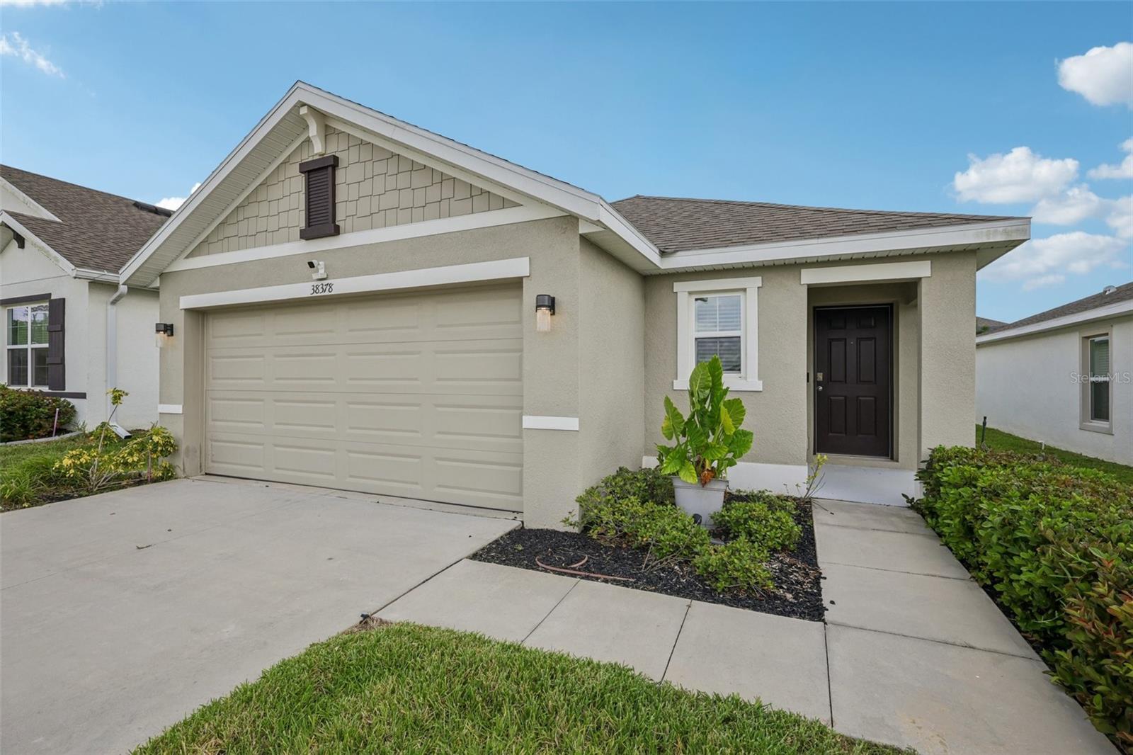 PROPERTY IS ELIGIBLE FOR USDA 100% FINANCING! The seller has a VA assumable loan with a 4.75% interest rate. Welcome to this charming 3-bedroom, 2-bathroom gem in Abbott Park, nestled in the rapidly growing city of Zephyrhills!
Thoughtfully constructed with durable concrete block construction by D.R. Horton, this home also features the D.R. Horton Smart Home System, seamlessly integrating technology into your daily routine. The split floor plan offers added privacy, making it ideal for families or guests.
Step into the modern kitchen, complete with stainless steel appliances and granite countertops, perfect for both everyday meals and entertaining. Enjoy your morning coffee or evening unwind on the screened lanai, and take advantage of the fully fenced backyard for pets, play, or peaceful relaxation.
Located just 25 minutes from The Shops at Wiregrass and Tampa Premium Outlets, you’ll have access to a wide array of shopping, dining, and entertainment options. Everyday essentials are close at hand, and Advent Health Zephyrhills is just minutes away for top-tier medical care.
Cable and internet are included in the HOA’s quarterly dues, adding extra convenience to your lifestyle. Experience the perfect balance of tranquility and accessibility in this beautiful Abbott Park home.