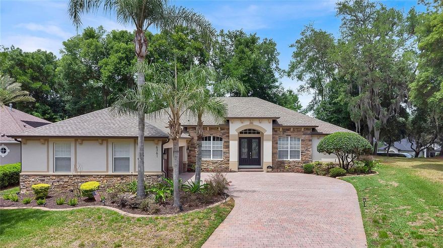 Desirable Buckingham Estates off Markham Road is a guard gated community located by Seminole's Wekiva Trail. This exquisite home is situated in the highly sought after street of Bordeaux Circle and offers a perfect blend of comfort and sophistication. Newly installed items: 2024-26 = new roof with Leaf Filter gutters; solid Brazilian Cherry hardwood floors, porcelain tile in bathrooms & laundry, salt water in-ground pool conversion, re-screened lanai; 7 speaker sound system; water heater; granite countertops in kitchen with 9' waterfall island, bathrooms & office; kitchen pot filler; renovated bathrooms including spa like master bath with standalone soaking tub & walk-in shower with rainfall & 2 separate messaging shower heads; lighting fixtures, in-house storage closet; walk-in pantry; 8" baseboards; door trim & interior paint; re-plumbed & rewired. Many other high end features include, but not limited to, solid wood interior doors; plantation shutters; Viking Professional kitchen appliances, including a 6-burner gas stove/oven, electric built-in oven, microwave/steamer/convection oven, refrigerator and drink fridge; Bosch dishwasher; 9’ – 14’ ceilings; 3 car attached garage; pool shower; split floor plan; bedroom closets with custom organizers. Experience the beauty & comfort.