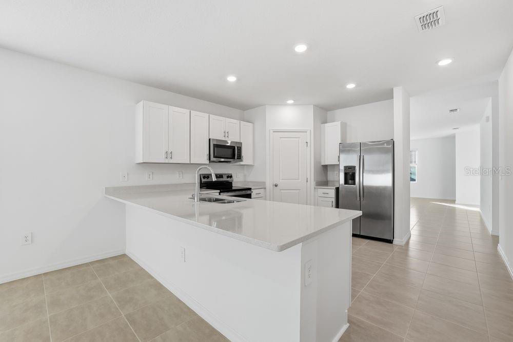 13502 TROPICAL BREEZE WAY