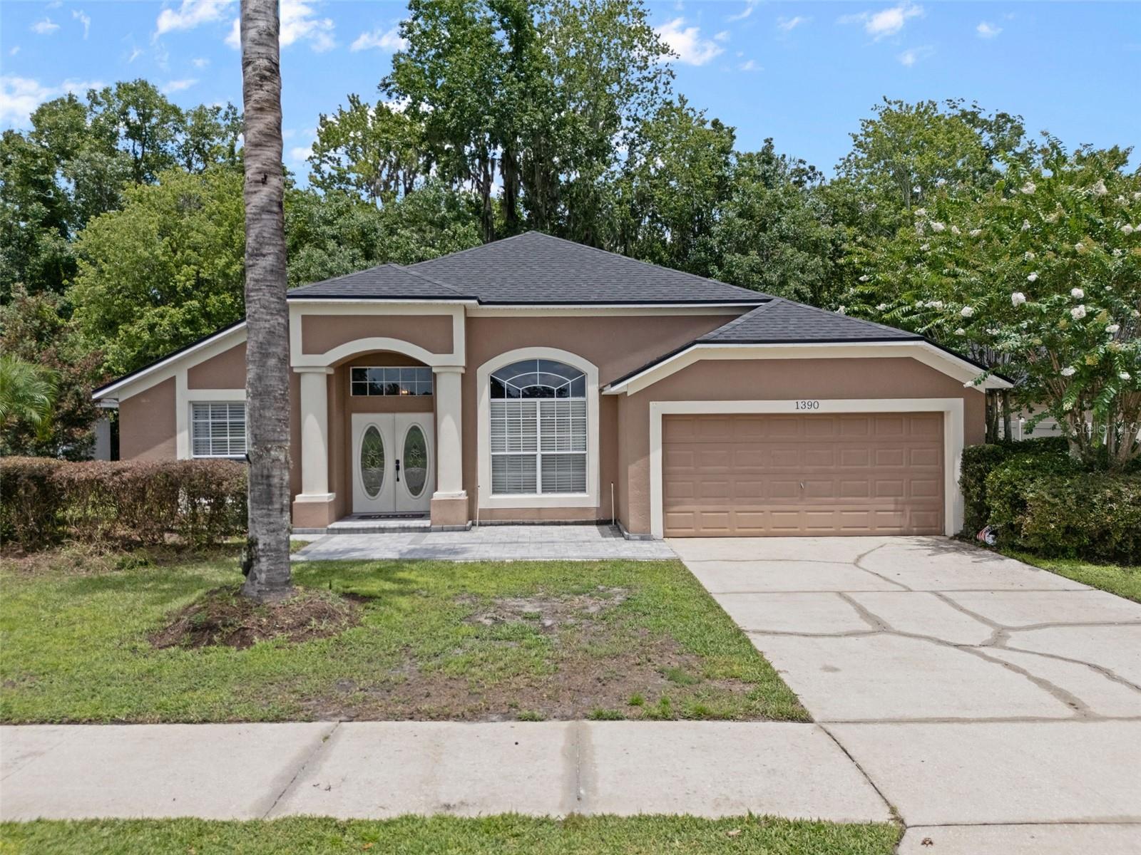 Welcome to your peaceful retreat in Riverside at Twin Rivers community! This spacious 3-bedroom, 2-bathroom home sits on a conservation lot with a tranquil pond view from the front and a private, wooded backyard. With 1,702 square feet of living space, the open, split floor plan offers flexibility and comfort throughout.
Enjoy wood flooring in the formal dining room and front flex space, perfect for a home office, playroom, or second living area. The tile-floored great room connects seamlessly to the updated kitchen, featuring freshly painted cabinets, a stylish backsplash, quartzite countertops, stainless steel appliances, a breakfast bar, and a cozy dinette area. With multiple dining options, this home is ideal for both casual meals and entertaining. Triple sliding glass doors open to a screened-in patio with an in-ground spa, overlooking a peaceful, conservation-backed backyard — no rear neighbors and minimal maintenance required. Out front, an expanded paver patio provides the perfect spot to enjoy the pond view and Florida sunsets with a small table and chair set. The primary suite includes a walk-in closet and en-suite bath, while bedrooms 2 and 3 feature brand-new carpet and share an updated guest bathroom. A new roof was installed in 2022, providing long-term value and peace of mind.
Situated in a quiet neighborhood within top-rated Seminole County schools, including Partin Elementary inside the community, with Chiles Middle and Hagerty High nearby. Just outside the entrance, you'll find a local plaza with a pizza restaurant and bar, small grocery store, gym, and other convenient vendors. Publix is also just minutes away.Enjoy easy access to Little Big Econ State Forest, Lake Mills Park, and Flagler Trail, along with nearby shopping and dining at Oviedo on the Park, Waterford Lakes, UCF, and SR 417. This home offers space, comfort, and everyday convenience — come make it yours!