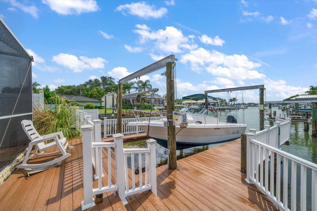 Photo of 1670 Clearwater Harbor Drive, Largo, FL 33770 (MLS # TB8428141)