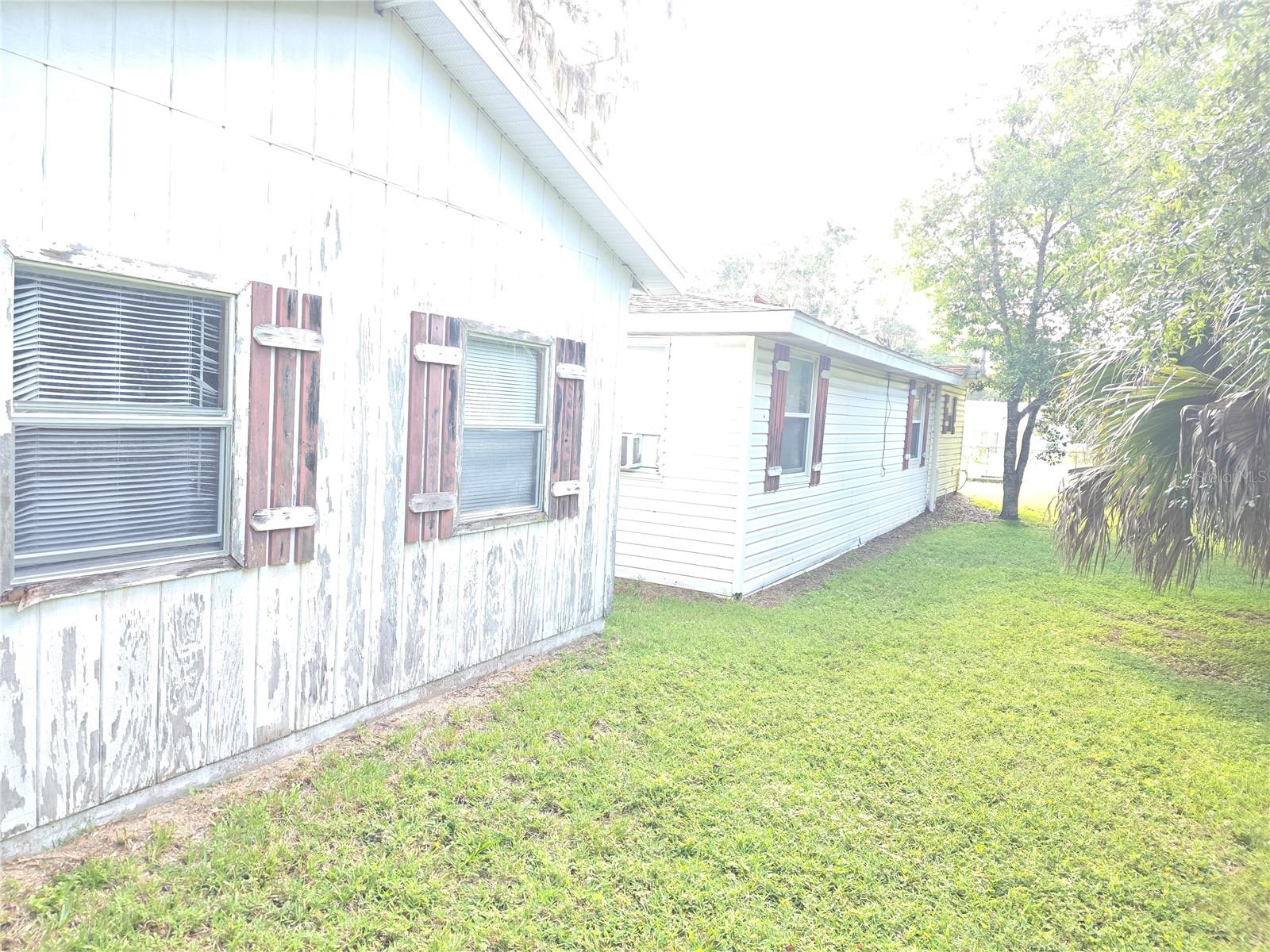 Large home situated in the heart of Belleview sitting on over half an acre. The property has over 1800 sq ft of living space with a large detached garage as well as a large workshop.
