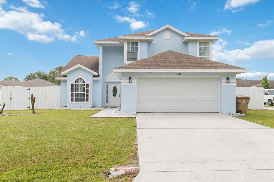 Welcome to this beautiful 2-story pool home located in the desirable Poinciana Village community! Offering 3 bedrooms, 2.5 bathrooms, and 1,978 square feet of living space, this home combines comfort, functionality, and inviting indoor-outdoor living. Step inside to discover soaring high ceilings and a spacious, bright living area filled with natural light. The thoughtfully designed kitchen features an abundance of counter and cabinet space, along with both a breakfast nook and a separate dining area conveniently positioned on either side of the kitchen, making it ideal for everyday living and entertaining alike. The main level features the spacious primary suite complete with an en-suite bathroom showcasing dual sinks and a walk-in shower. A convenient half bathroom is also located downstairs for guests. Upstairs, you’ll find two additional bedrooms and a large shared bathroom with dual sinks and a tub/shower combination, accessible from both the hallway and one of the bedrooms. Step outside to enjoy the heart of the home — the screened-in lanai with an in-ground pool, perfect for relaxing or hosting gatherings year-round. Beyond the lanai, the spacious fully fenced backyard offers additional room to enjoy the outdoors. Conveniently located near health facilities, grocery stores, restaurants, lakes, and major highways, this home offers easy access to everyday essentials while making commuting a breeze. Mortgage savings may be available for buyers of this listing.