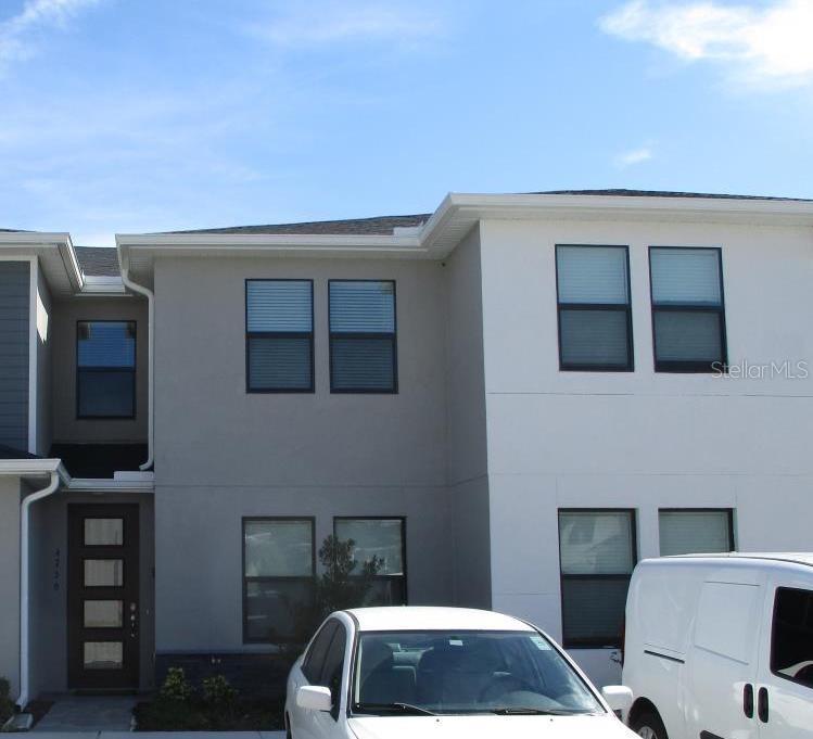 Welcome to this Theme Dream move-in ready townhome in the highly desirable Terra Esmeralda gated community in Kissimmee! This spacious 4-bedroom, 2,5-bath home features an open-concept layout, modern kitchen with granite countertops and stainless steel appliances, and a private patio - perfect for entertaining. Enjoy the resort-style amenities including a pool, playground, and clubhouse. Just minutes from The LOOp, Disney Parks, Schools, Restaurants, and major Highways. Don't miss the opportunity to live in high style.