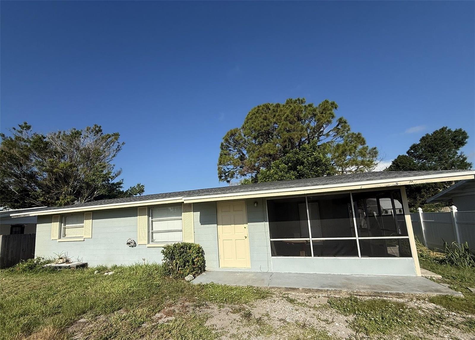 Charming 2 bedroom 1 bath home on a quiet street. Freshly painted interior and new flooring throughout. Washer & dryer hookup. Large backyard, screened lanai. This home is move-in ready and won't last long!