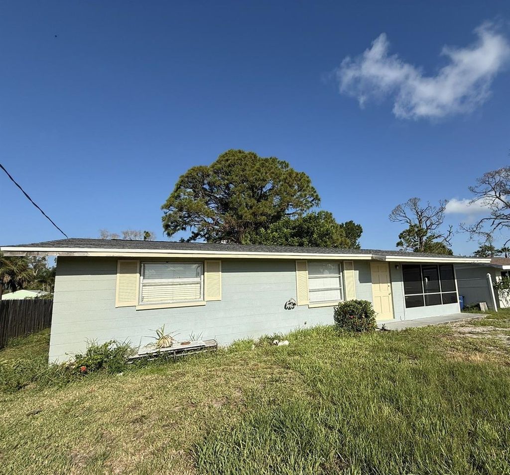 Photo of 860 Michigan Avenue, Englewood, FL 34223 (MLS # C7513838)