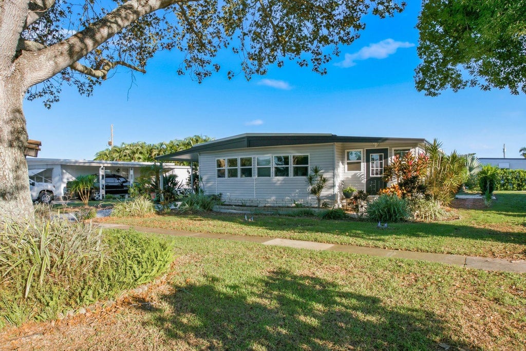 Photo of 185 Lake Tarpon Drive #31, Palm Harbor, FL 34684 (MLS # TB8557753)