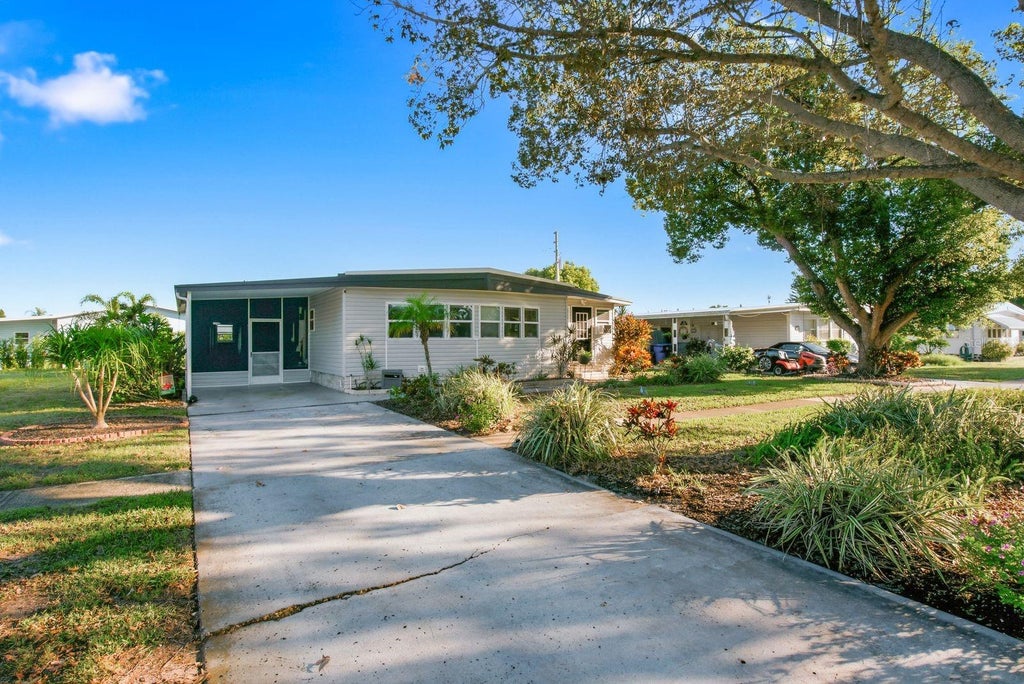 Photo of 185 Lake Tarpon Drive #31, Palm Harbor, FL 34684 (MLS # TB8557753)