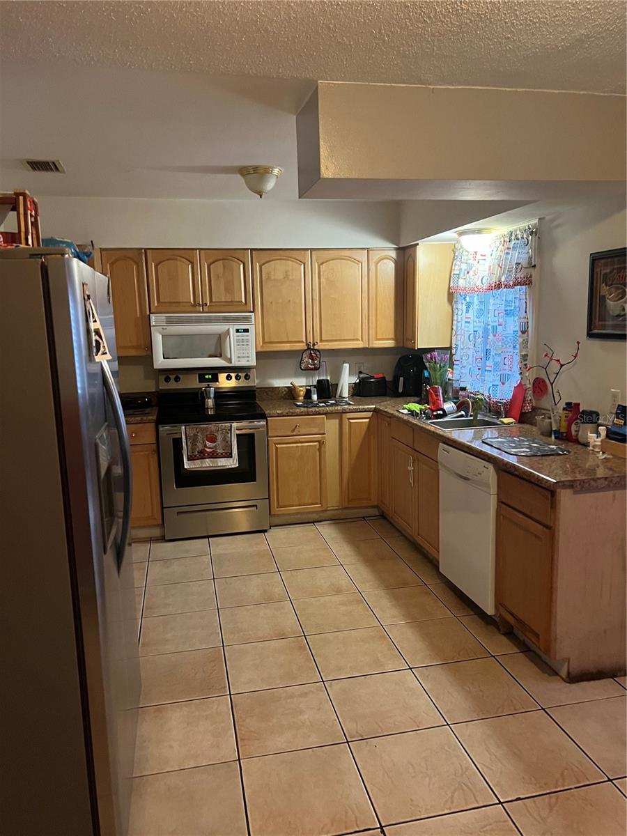Photo of 830 Baltimore Dr, Orlando, FL 32810 (MLS # O6440373)
