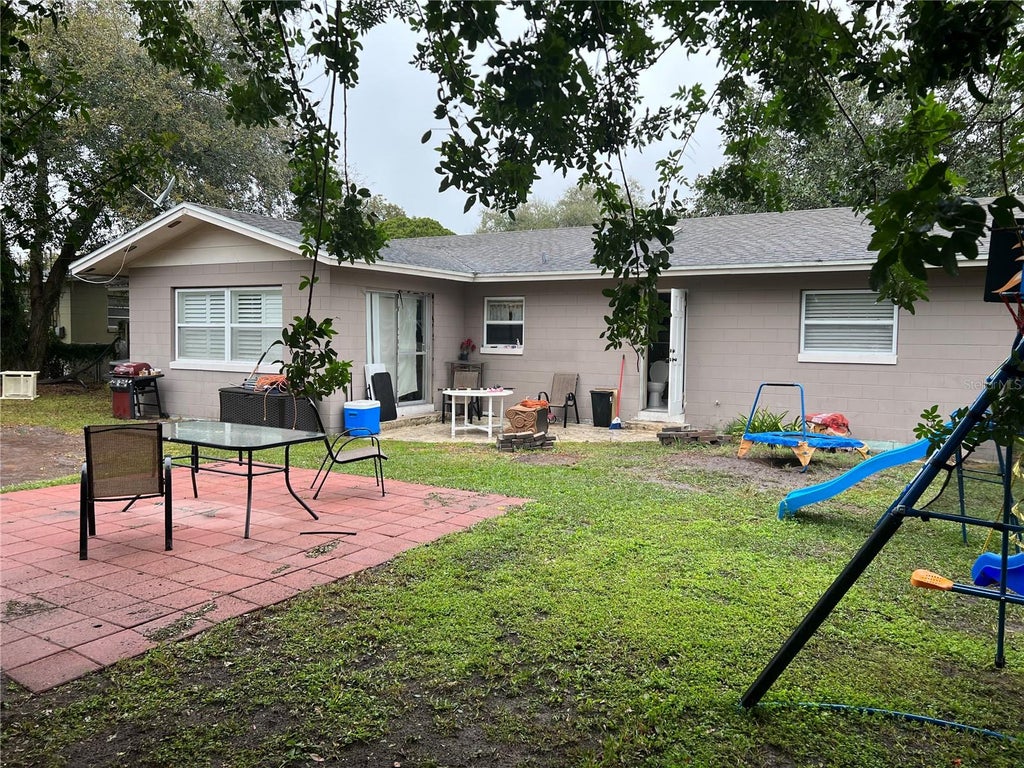 Photo of 830 Baltimore Dr, Orlando, FL 32810 (MLS # O6440373)