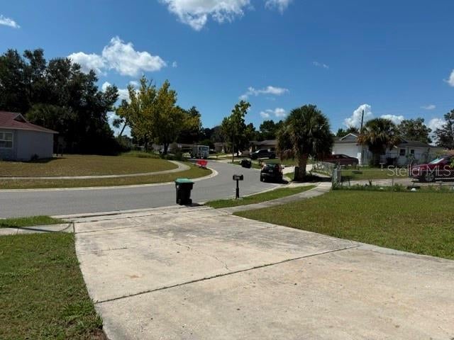Photo of 4521 San Sebastian Circle, Orlando, FL 32808 (MLS # O6435859)