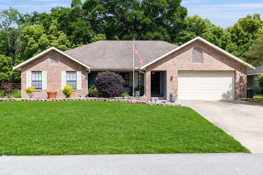 Welcome to a beautifully remodeled 3 bedroom, 2 bathroom pool home tucked away on a quiet dead end street in Ocala. It is a safe and private spot where you can relax and feel at home right away. Inside, the layout is simple and works well. You have a split floor plan for privacy, a cozy family room with a fireplace, and space to sit and unwind. The kitchen has been updated with new appliances and countertops, plus a bright breakfast nook for easy mornings. You step out onto a newly remodeled deck that leads into a fully refinished screened-in pool and hot tub area. It is private, it is clean, and it is built for real life. Picture summer afternoons in the pool, evenings in the hot tub, family laughing, friends over, music playing, dinner outside. This is not just a backyard. It is your escape. It is private, easy to enjoy, and perfect for everyday living or having friends over. Both bathrooms connect to the pool, which makes life simple. The primary bedroom is spacious with a walk in closet and a large shower. There is also a formal dining room for dinners and get togethers. This home is updated, comfortable, and ready for you to move in and enjoy right away. Book a showing today!