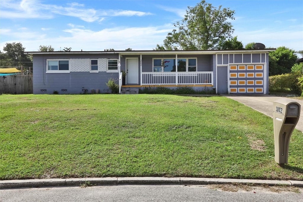 Photo of 3002 Drake Drive, Orlando, FL 32810 (MLS # O6446487)