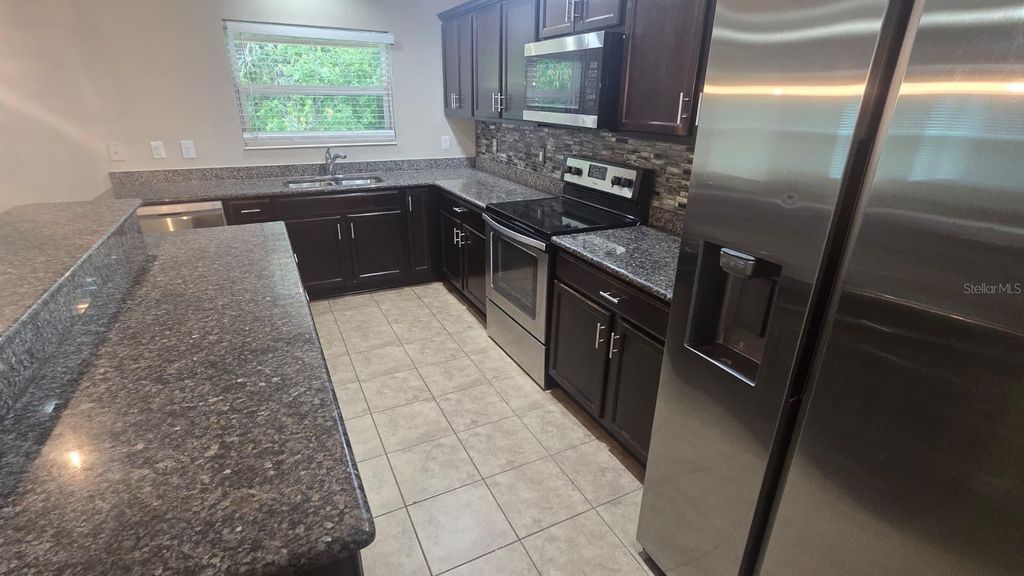 Photo of 7267 Somerset Pond Drive, Ruskin, FL 33573 (MLS # TB8410477)