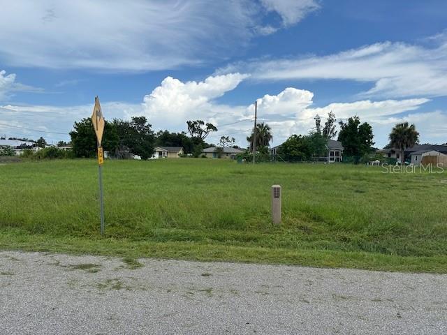 Cleared building lot with water and sewer available in central Port Charlotte. Near shopping, hospitals and amenities. Can be purchased with 823 Spring Lake and combine for almost 1/2 acre building lot or keep to build two homes for investment.