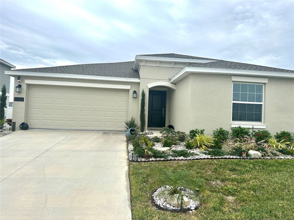 Photo of 2262 Pigeon Plum Drive, Haines City, FL 33844 (MLS # O6390304)