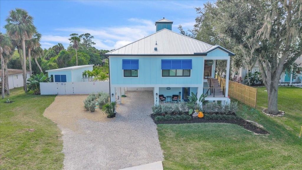 Photo of 9470 Colony Drive, North Fort Myers, FL 33917 (MLS # A4689220)