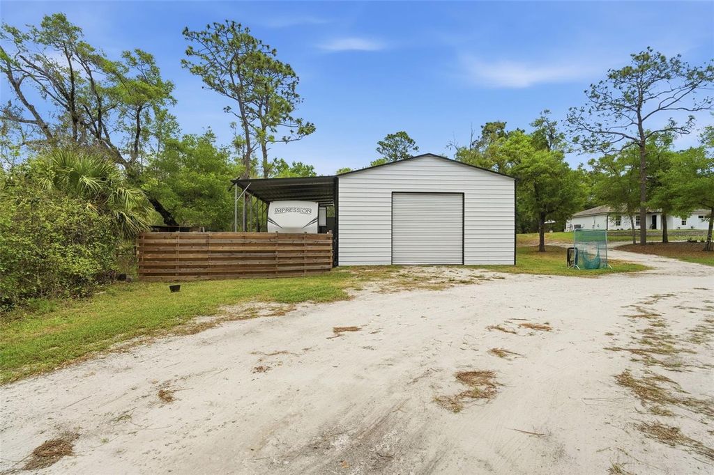 Photo of 2110 E Kicklighter Road, Lake Helen, FL 32744 (MLS # V4948122)