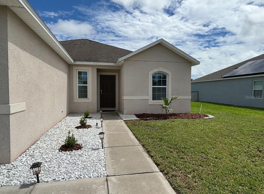 Photo of 724 Lake Cummings Boulevard, Lake Alfred, FL 33850 (MLS # S5141502)