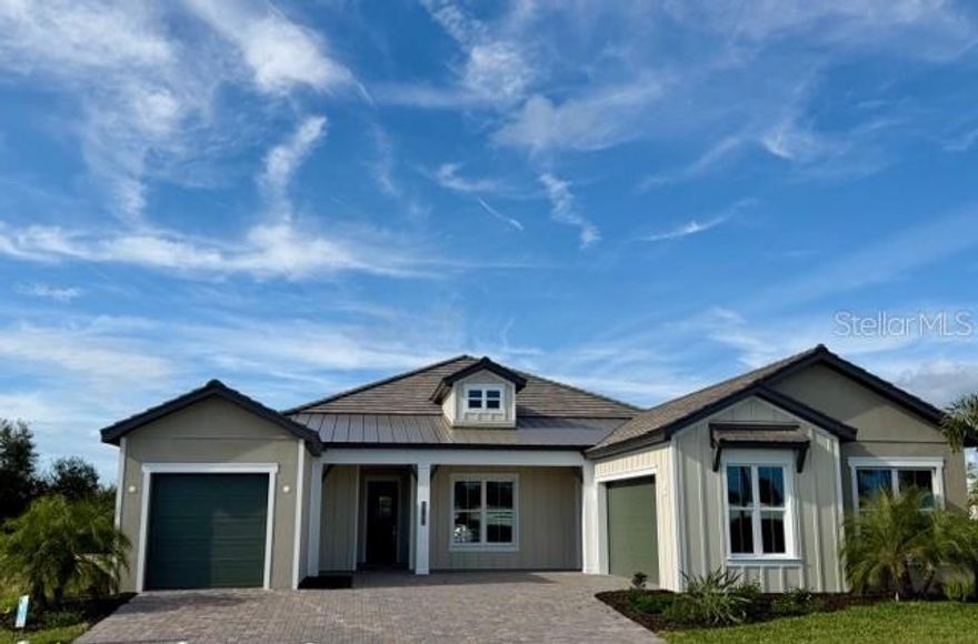 Under Construction. Welcome to Gran Place at Wellen Park – an exclusive Sam Rodgers Homes private enclave of just 42 custom homes.

Introducing the Destin Modern Farmhouse—Completed Quick Move-In Home. This 2,932 sq. ft. home offers 3 bedrooms, 3 baths, a bonus room, den/office, with PGT impact glass windows and doors and oversized 2-car garage + separate 1 car garage.  Outdoor living shines with a private pool, spa, outdoor kitchen, spacious paver lanai, and peaceful preserve and palm views. 

Inside, the open great room design is anchored by a gourmet kitchen featuring an oversized center island, quartz countertops, built-in stainless steel appliances, soft-close wood cabinetry, and a natural gas cooktop—perfect for hosting family and friends. The private primary suite boasts dual walk-in closets and a spa-like bath with dual vanities and a soaking tub.

Gran Place is a natural gas community designed with chefs and entertainers in mind. Sam Rodgers Homes is known for unmatched quality and craftsmanship that speaks for itself.

As a resident, you’ll also enjoy exclusive membership opportunities with Plantation Golf & Country Club. Through this special partnership, Gran Place homeowners can access private membership incentives available only to our community, with amenities including:

Two championship 18-hole golf courses, Expansive practice facilities, Jr. Olympic-sized pool, 24-hour fitness center, 12 Har-Tru tennis courts, 6 pickleball courts, Bocce courts, Multiple dining venues and year-round social events. 

Beyond Gran Place, the Downtown Wellen District offers waterfront dining, boutique shopping, entertainment, and year-round events across 175 acres. Residents enjoy a 3-mile health and wellness trail, food truck arena, splash pad, playground, activity lake with paddle boards and kayaks, plus over 20 miles of scenic nature and fitness trails.

With easy access to major highways, world-class beaches, Downtown Venice, and Downtown Sarasota are all within reach. Families will also appreciate proximity to top-rated Sarasota County schools.

The Destin Farmhouse delivers everything you want—and more—in one of Venice’s most desirable new communities.