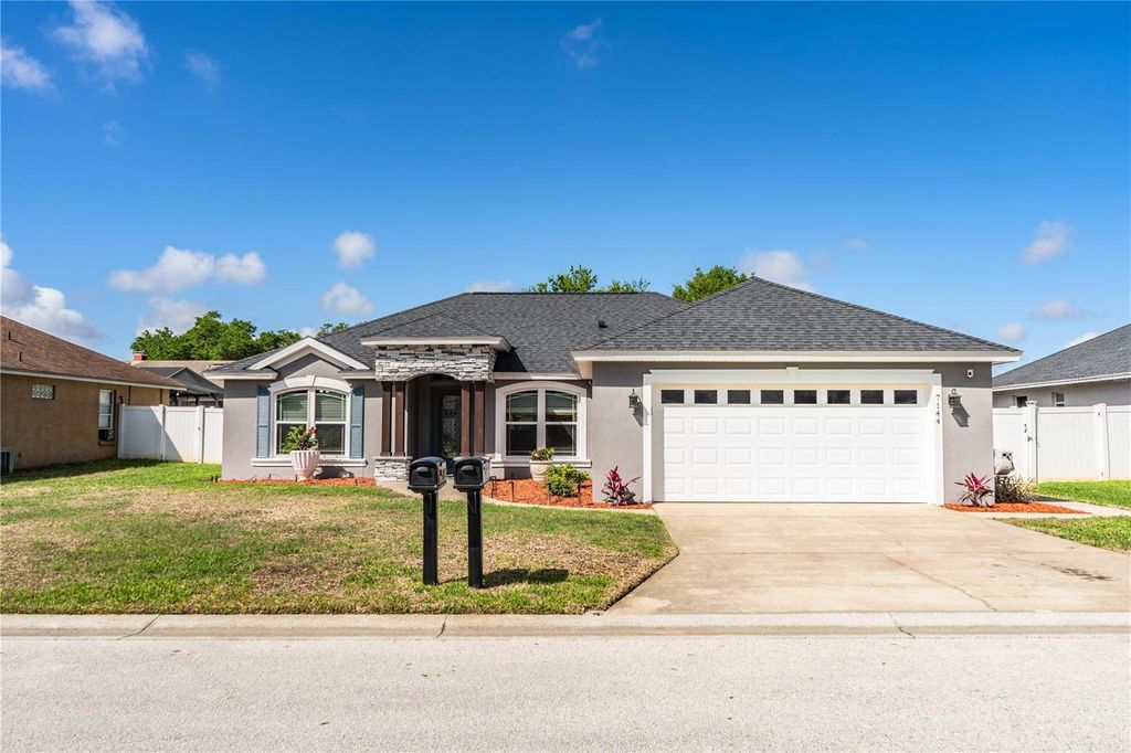 Photo of 7144 Remington Oaks Loop, Lakeland, FL 33810 (MLS # L4959704)