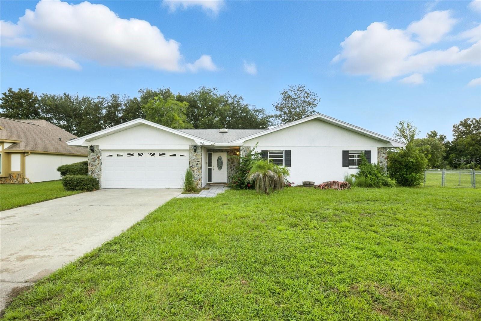 Welcome to this charming 3-bedroom, 2-bathroom home located in the heart of Homosassa. This property features a spacious open floor plan filled with natural light, perfect for both everyday living and entertaining. The kitchen offers ample cabinet space, modern appliances, and a convenient breakfast bar.
The primary suite includes a comfortable layout with an ensuite bathroom for added privacy. Two additional bedrooms and a second full bath provide plenty of space for family, guests, or a home office.
Sitting on a generous lot with mature landscaping, this home offers the ideal Florida lifestyle. Whether you enjoy gardening, hosting outdoor gatherings, or simply relaxing under the sun, this backyard is ready for it. Conveniently located near shopping, dining, schools, and the famous Homosassa Springs, this property is perfect as a primary residence, vacation retreat, or investment opportunity.