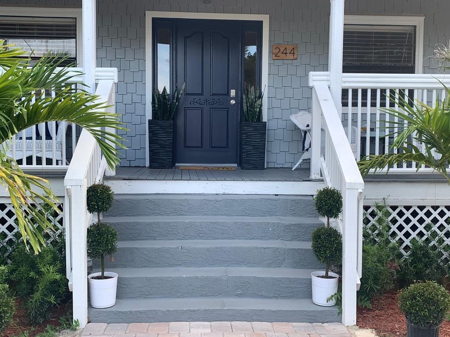 Beautiful and totally renovated 3 bedrooms, one full bath completely furnished on the first floor and  3 bedrooms, one full bath completely furnished on the second floor. Private entrances to accommodate separate renters. Also can rent as a multigenerational family. It is a total of 6 bedrooms and 2 full baths. This cozy home has stainless steel appliances, washer and dryer inside the property. Large front porch with partial view of the marina. Just 2 minute walk to the popular Caribbean Jack's Marina & Restaurant, and just 0.7 miles to the beach. This property is centrally located near restaurants, shopping centers, coffee shops, beaches, supermarkets, and hospitals.