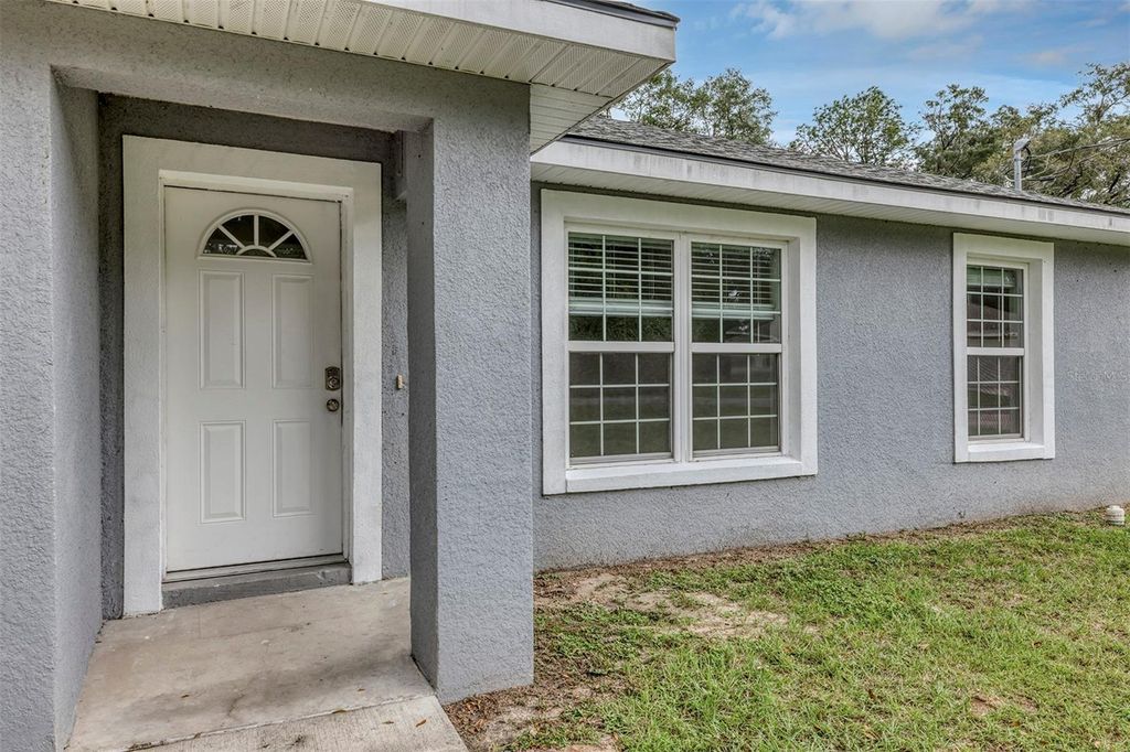 Photo of 12331 SE 67th Terrace Road, Belleview, FL 34420 (MLS # O6354003)