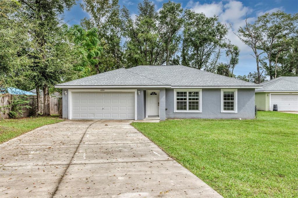 Photo of 12331 SE 67th Terrace Road, Belleview, FL 34420 (MLS # O6354003)