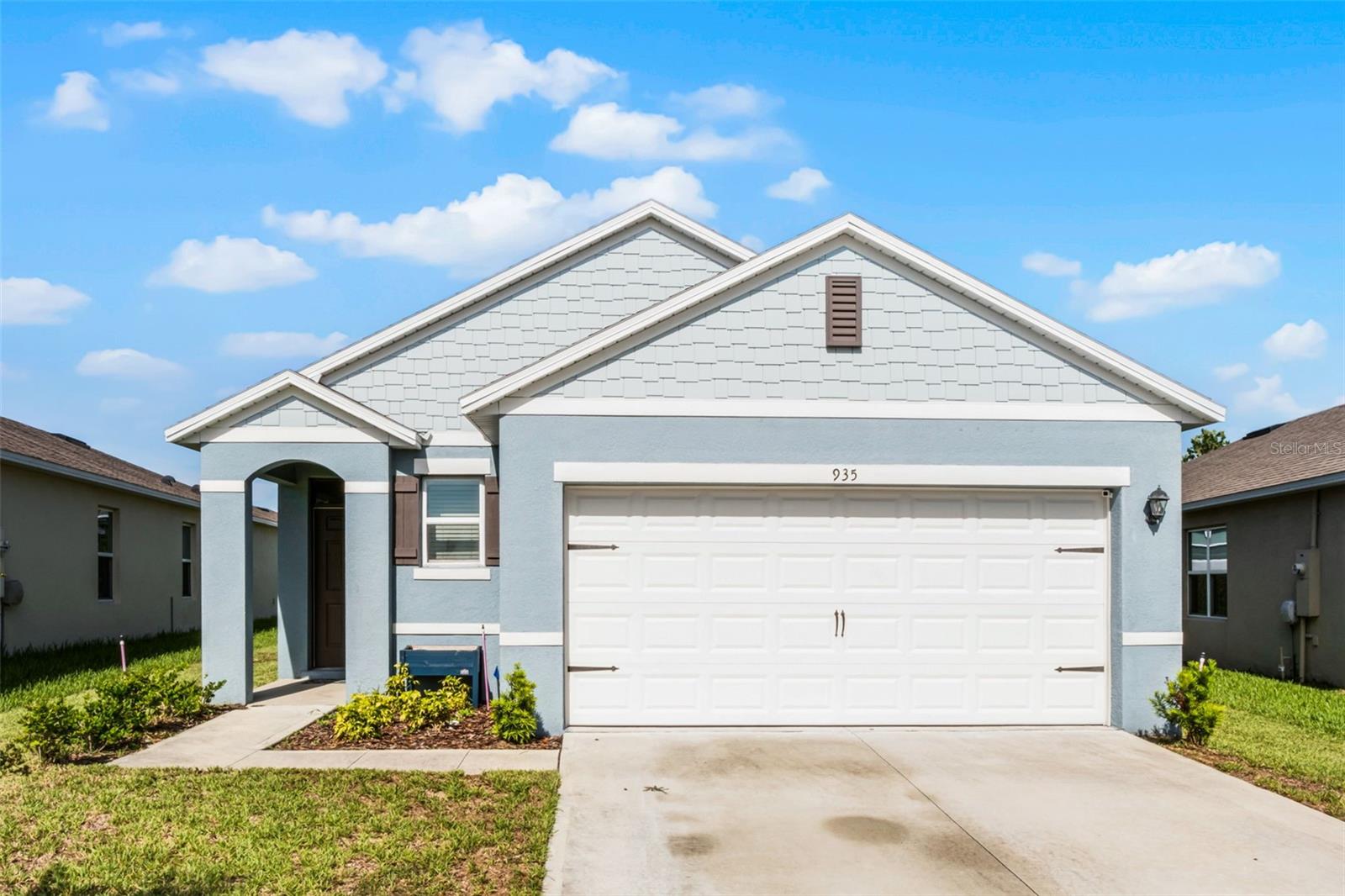 Step into this bright and thoughtfully designed 3-bedroom, 2-bathroom home, built in 2023 and located in the Courtland Park community of Deltona. With approximately 1,649 square feet, this residence perfectly combines modern convenience with a welcoming style.
The heart of the home is the open-concept kitchen, featuring stainless steel appliances, abundant cabinetry, a walk-in pantry, and tile flooring in all wet areas. A breakfast bar with seating for four provides the ideal spot for casual meals, conversations, or morning coffee. Just steps away, the dedicated dining area offers space for more formal gatherings and seamlessly connects to the spacious living room, where natural light flows in and ample space for relaxation or entertaining guests awaits.
The private owner's suite serves as a retreat, boasting a dual-sink vanity, a walk-in shower, and a generous walk-in closet. The two additional bedrooms are bright and offer plenty of closet space for storage. They share a full-size bathroom.
A sliding glass door in the living room opens to the covered rear patio, which overlooks your backyard. There is plenty of room to create your ideal outdoor space, whether that be a garden, a play area, or an entertainment patio.
This property is conveniently located near shopping, medical centers, and parks, and it is only about 20 minutes from Sanford International Airport, offering both convenience and tranquility.