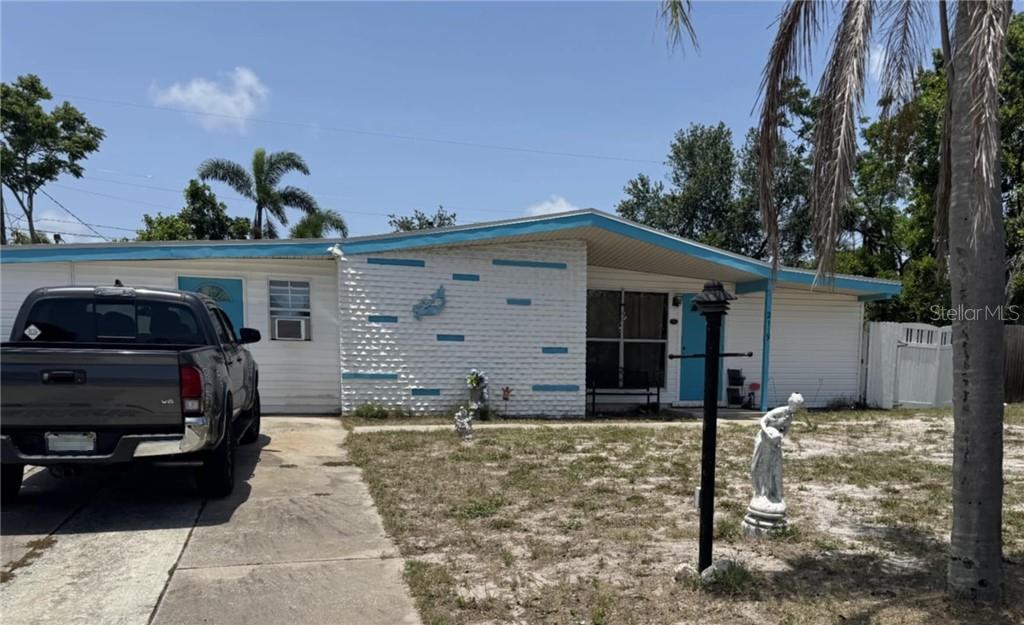 Fractional Ownership. Newer refrigerator with icemaker, one bathroom has been remodeled and updated, new a/c, polyglass roof with water barrier. Other features of the home include a fenced yard, detached storage building. Large concert slab with nice sturdy wooden gazebo. Included in your annual property taxes is a $345 HOA fee. With ownership in Bayshore Gardens, you get use of the private boat ramp, the ability to rent a boat slip(when available)in the Bayshore Gardens marina and use of the community pool and recreation center.
The separate living areas and space. Large yard and parking . Convenient to eating, shopping, banking, and the Bay. Kayak storage and launch area at the recreadtion center. Huge pool and a rentable club house. Join the multitude of club {ex. Yacht and Garden} Events such as Pancake Breakfast, Thanksgiving Dinner and Potlucks. Bring the whole amily!!