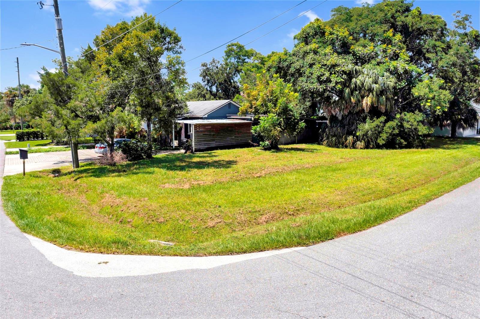 Build Your DREAM HOME on the 3rd Hole of Dubsdread Golf Course! Seize a rare and exceptional opportunity to construct your custom dream home in the heart of Orlando's COLLEGE PARK neighborhood. This perfectly cleared .16-acre lot (50x150) offers stunning views of the historic Dubsdread Golf Course's 3rd hole and provides a blank canvas for your unique vision. Property Highlights - Prime Location: Nestled in one of Orlando’s most desirable neighborhoods, this property is just steps from the vibrant Edgewater Drive, renowned for its boutique shopping and local dining hotspots. In minutes you can be at Advent Health Main Campus, Bishop Moore and Orlando Junior Academy. Ready to Build: The lot is cleared and ready for immediate construction. A survey and building plans are available, saving you valuable time and resources. NO HOA: Enjoy the creative freedom to design and build your home without the restrictions or fees of a Homeowners Association. Thriving Community: Benefit from the proximity to the exciting new 200-acre development known as The Packing District, a hub of future growth and entertainment.
After 40 years of ownership, the seller's plans have changed, creating the perfect moment for you to step in. Whether you are a builder seeking a prime project or a future homeowner ready to bring your vision to life, this is your chance to create something truly special in a location that offers both tranquility and convenience. Don't miss out on this unique opportunity. Bring your plans and start building your future today!