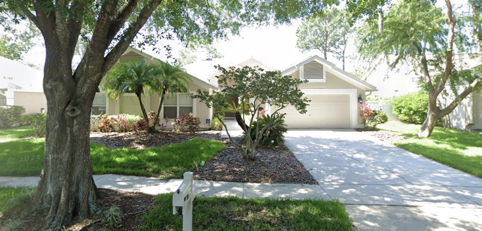 One or more photo(s) has been virtually staged. This one-story home features 4 bedrooms and 3.5 bathrooms, offering plenty of space and comfort. The kitchen includes an island and bar seating, perfect for entertaining, while the living room is centered around a welcoming fireplace. A private pool with a screened lanai creates the ideal setting for outdoor relaxation. A 2-car garage adds convenience and storage. One or more photos have been virtually staged to showcase the home’s potential. Schedule a showing today!