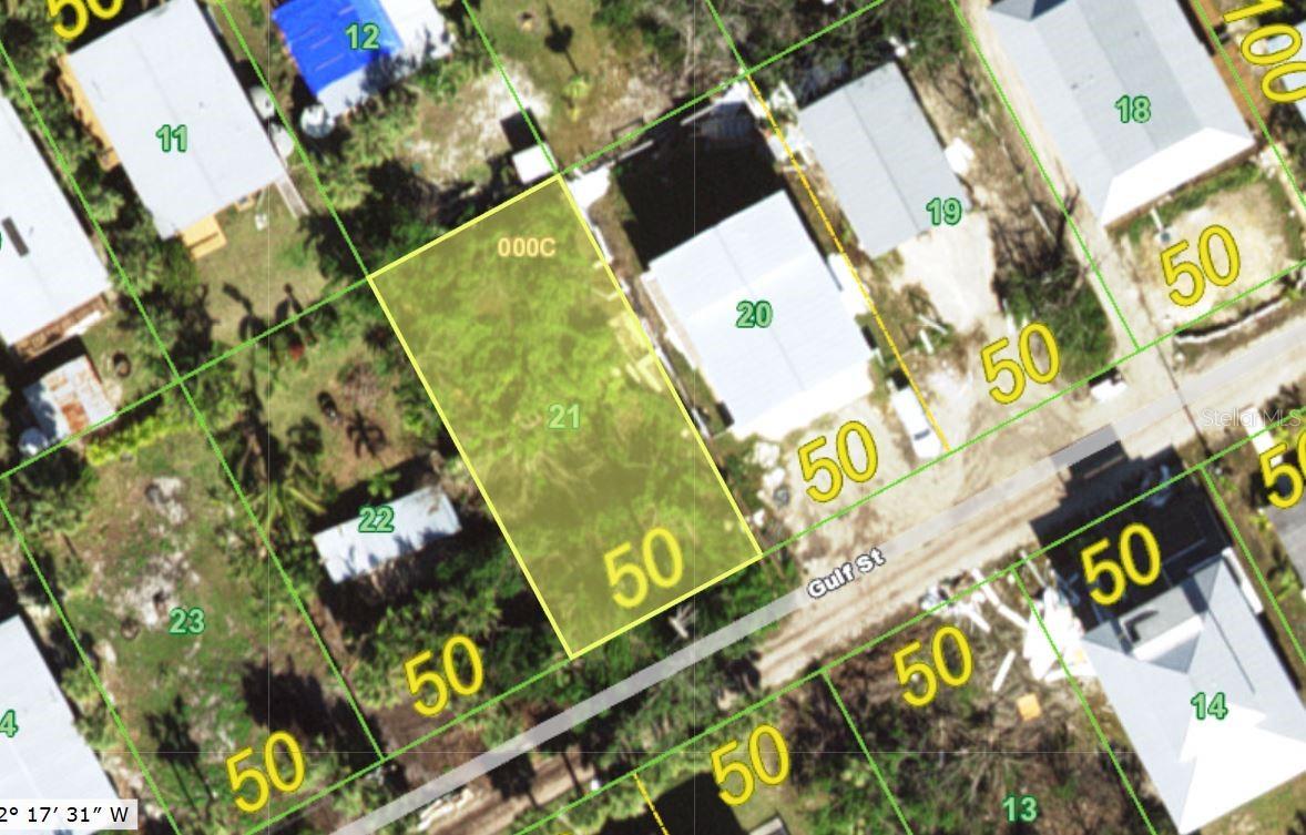 Price Reduced. This vacant lot is located on Little Gasparilla Island which is a bridgeless barrier island off the mainland of Cape Haze Peninsula. It is a 10-minute ride over in your private boat or by the water taxi to the island. The island is quiet and peaceful no restaurants or stores just plenty of sandy trails and tropical foliage. 3 1/2 miles of beautiful, uncrowded beach to walk looking for seashells & shark's teeth, swim, fish, or just sit and relax the day away. Then at the end of the day meet your friendly neighbors at the water's edge to watch the sun set on another blissful day in paradise. There are plenty of waterfront restaurants nearby to go to. If you like to fish, you'll enjoy catching redfish, snook, snapper, tout, and more in the surrounding waters. This is a great place to come and build your island retreat.