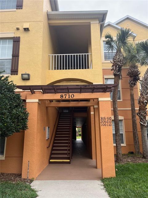Photo of 8710 Saratoga Inlet Drive #207, Orlando, FL 32829 (MLS # S5147754)