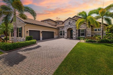 Photo of 6337 Rivo Lakes Boulevard, Sarasota, FL 34241 (MLS # A4634489)