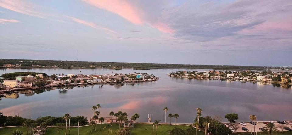 Waterfront condo, Panoramic views of the Intercoastal, On one side, And the beach is on the other side, 15th floor condo, 995 sqft plus 160 sqft balcony, Large 1 bed 20 feet x 11 feet, 1.5 baths, New toilets, Kitchen 9 feet x 11 feet, Newer appliances, Large living area 26 feet x 13 feet, Large balcony 24 feet x 80 in, Storm shutters, Redington Towers has all the Amenities, Large pool, Community rooms, Covered parking space, Free parking on the street also, Close to restaurants, Short drive to Publix or Winn Dixie. Very well-maintained building recently passed a milestone inspection and has a very well run HOA. This unit includes one parking space on the lower level (#25) (Covered) and additional storage unit. Furniture is negotiable. Redington Towers offers many outstanding amenities, including a large, heated beachfront pool with Gulf views, and a clubhouse, fitness room, billiards, table tennis, and air hockey. The outdoor BBQ area features both natural gas and charcoal grills, and there’s a library and a banquet room, perfect for parties, weddings, and various entertaining functions. For water enthusiasts, paddleboard and kayak storage is available, with convenient launch access at the beach or at the park across the street. Enjoy nearby dining, beach bars, coffee houses, parks, and much more including sunrise and sunset
views in Redington Beach!