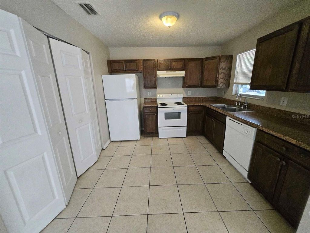 Photo of 3112 Gordon Court, Tampa, FL 33619 (MLS # O6324252)