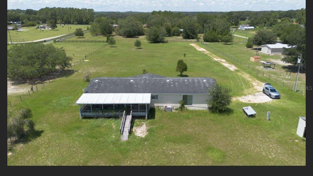 Photo of 16121 SE 170th Avenue, Weirsdale, FL 32195 (MLS # S5142418)