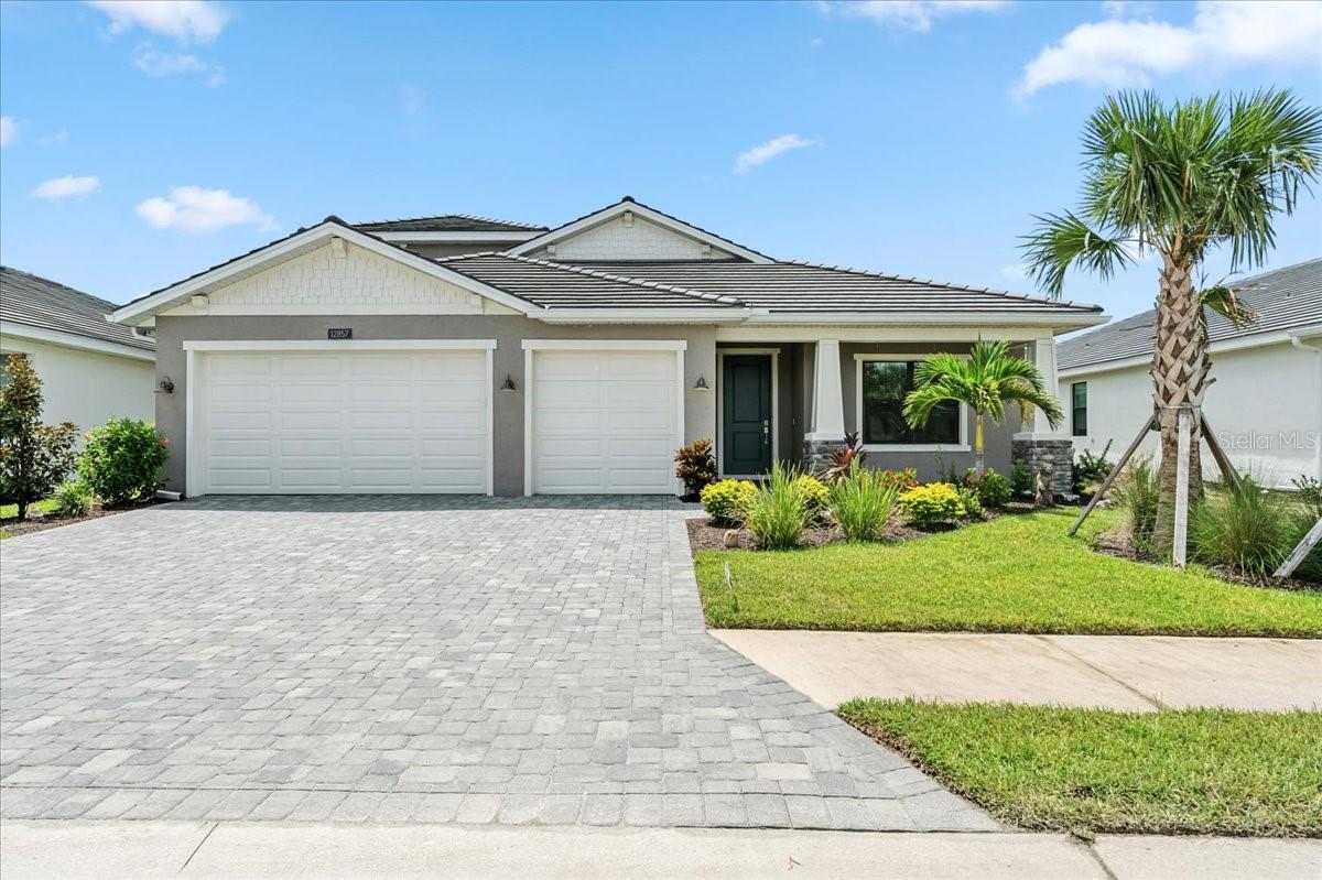 **STUNNING 2024-BUILT RESIDENCE IN SOLSTICE AT WELLEN PARK** This home was just completed last year and is basically BRAND NEW! This layout includes 5 bedrooms, HUGE bonus room, 4 full bathrooms, 3 car garage, **GORGEOUS HEATED POOL & SPA**, and 3203 square feet under air! Downstairs you’ll find the the primary suite, 2nd ensuite, 2 guest bedrooms, and guest bathroom. Upstairs you’ll find the bonus room, another guest bedroom, and guest bathroom. The owners spared no expense in custom designing this exquisite property. The main areas downstairs and the front bedroom have beautiful engineered hardwood floors. The loft & bedrooms have an upgraded stain resistant carpet— in perfect condition. The well-appointed chef’s kitchen features a gas cooktop, built-in oven and microwave, quartz countertops, modern designer cabinetry, tile backsplash, a sizable walk-in pantry, and a spacious center island w/ pendant lighting—perfect for entertaining your guests. The owners suite features a generous bedroom with plenty of room for a king sized bed and sitting area. The spa-like ensuite bathroom has a huge shower, dual vanities, MASSIVE walk-in closet, and water closet. The owners custom-designed this pool to include a large spa, sun shelf with bubbler, pebble finish, and spacious travertine pool deck— all overlooking the quiet preserve. For peace of mind during storm season, the entire home has hurricane impact windows and sliding doors! No need for any storm shutters! There is even a whole home generator. Located in an X flood zone so no need for flood insurance. Solstice is a gated, resort-style, natural gas community, with top-tier amenities including a state-of-the-art fitness center, zero-entry pool, pickleball courts, tennis courts, clubhouse, yoga lawn, dog park, and playground. Maintenance-free lawn care is also included, allowing you more time to enjoy the Florida lifestyle. The HOA fee is just $470 per month and pays for the community gates, amenities, lawn/landscape maintenance, pest control, irrigation, cable, & internet. The $2639 annual CDD fee is included in the taxes shown in this listing. From this neighborhood you can bike or golf cart to Downtown Wellen where you’ll find restaurants, entertainment, shopping, kayak rentals, splash pad, playground, coffee shop, Sunday farmer’s market, tons of events, and the Atlanta Braves Spring Training Stadium! This community is perfect for families, nature lovers, and anyone who enjoys an active lifestyle. Conveniently situated just minutes from major highways, great schools, numerous golf courses, and a short 15-minute drive will bring you to Venice Island, with it's beaches, charming boutique shops, dining options, fishing pier, and so much more! (Owners are relocating a few hours away for work.)(Floorplan coming soon- This is the "Sanderling-Elite" floorplan w/ additional bedroom downstairs and additional bedroom upstairs- totaling 5 bedrooms & 4 bathrooms.)